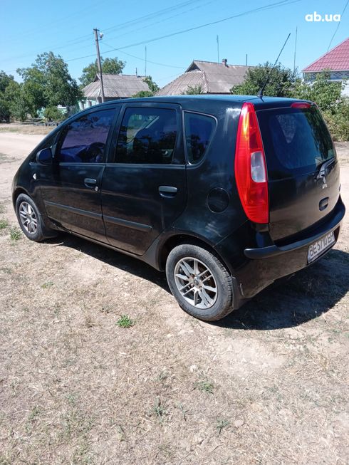 Mitsubishi Colt 2007 черный - фото 8