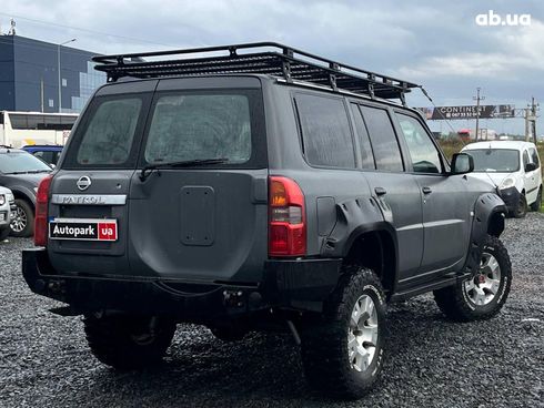 Nissan Patrol 2009 серый - фото 18