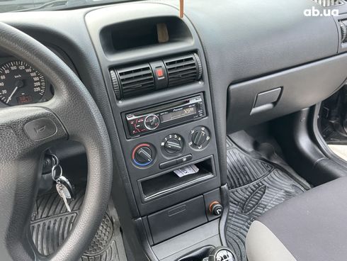 Opel Astra G 2008 черный - фото 8