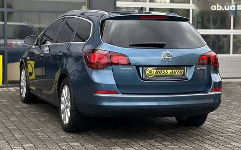 Opel Astra 2013 - фото 4