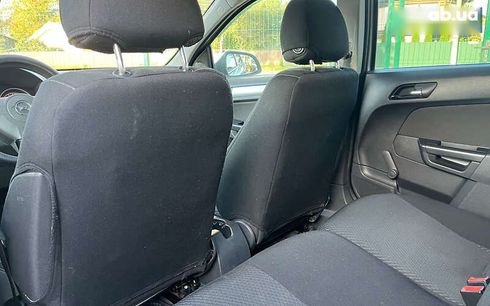 Opel Astra 2010 - фото 20