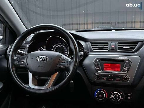 Kia Rio 2013 - фото 10