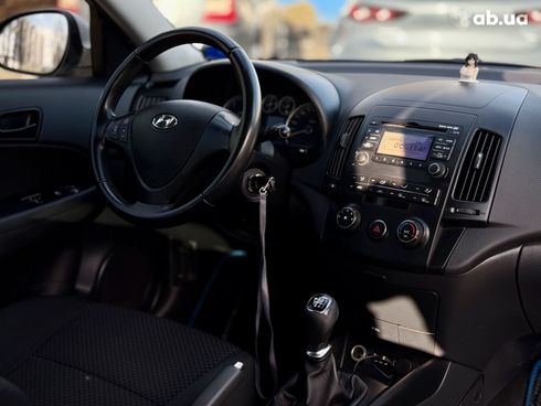 Hyundai i30 2011 белый - фото 16