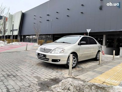 Toyota Corolla 2004 - фото 11