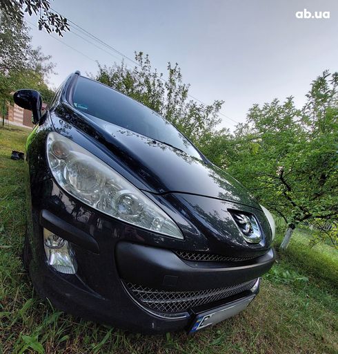 Peugeot 308 2009 серый - фото 2