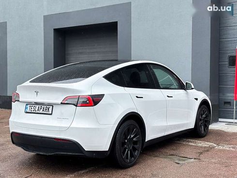 Tesla Model Y 2024 - фото 10