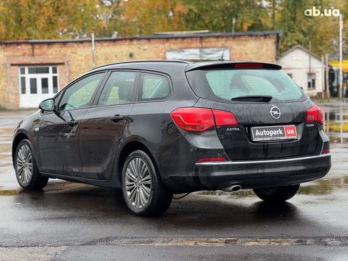 Opel Astra 2013 черный - фото 7