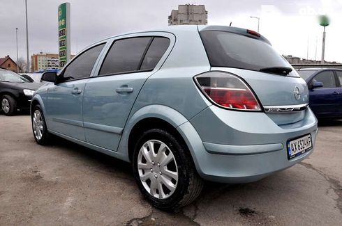 Opel Astra 2009 - фото 12