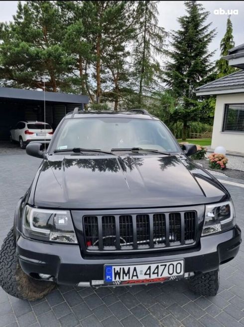 Jeep Grand Cherokee 2005 черный - фото 3