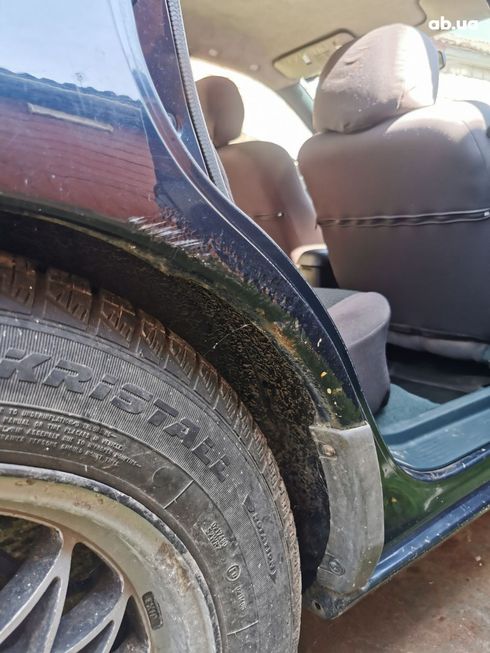 Mazda 323 1998 синий - фото 16
