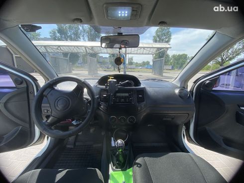 Geely MK 2013 белый - фото 11