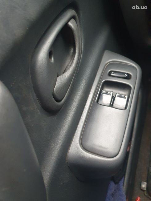 Suzuki Ignis 2002 зеленый - фото 3