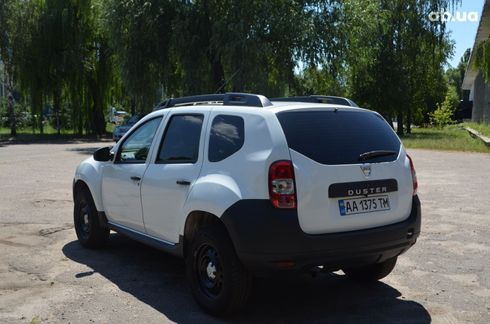 Dacia Duster 2016 белый - фото 6