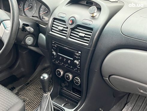 Nissan Almera 2008 черный - фото 20