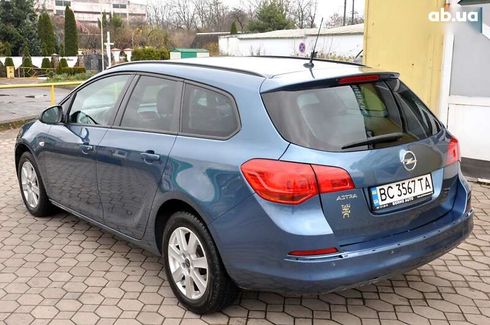 Opel Astra 2013 - фото 11