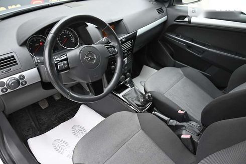 Opel Astra 2010 - фото 12
