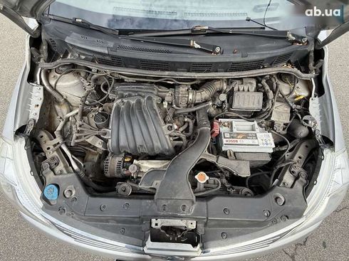 Nissan Tiida 2007 - фото 19
