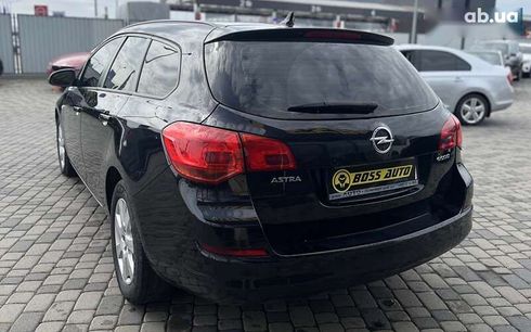 Opel Astra 2011 - фото 5