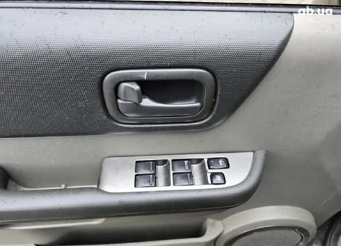 Nissan Navara 2006 черный - фото 3