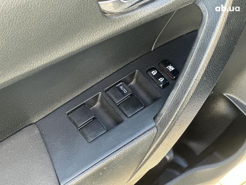 Toyota Corolla 2013 коричневый - фото 79