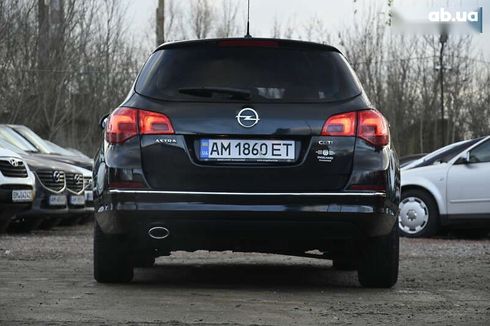 Opel Astra 2014 - фото 10