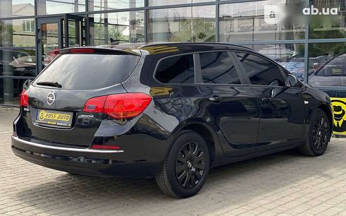 Opel Astra 2014 - фото 6