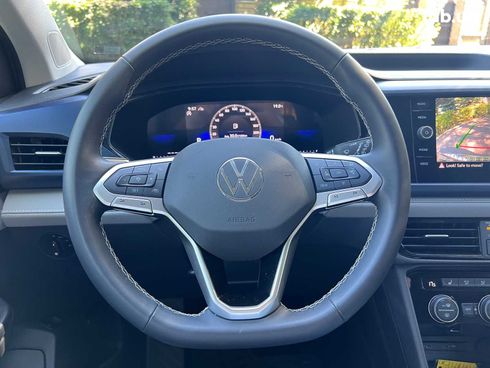 Volkswagen Taos 2023 синий - фото 16