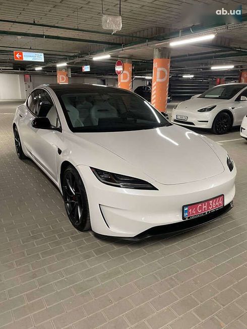 Tesla Model 3 2025 - фото 12