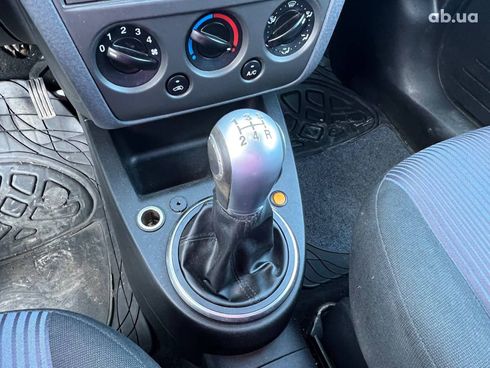 Ford Fusion 2011 белый - фото 28