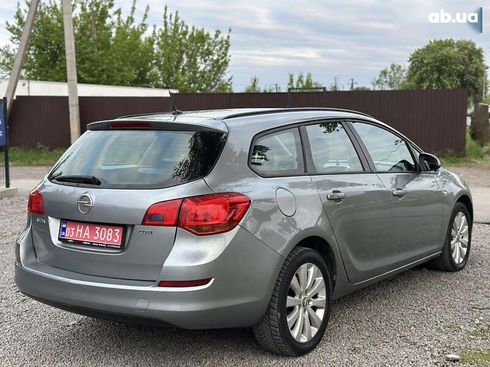 Opel Astra 2010 - фото 22