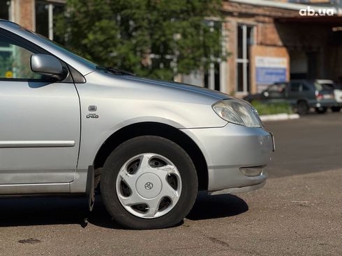 Toyota Corolla 2003 серый - фото 14