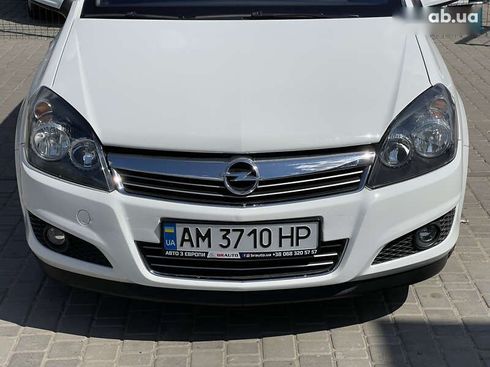 Opel Astra 2010 - фото 14