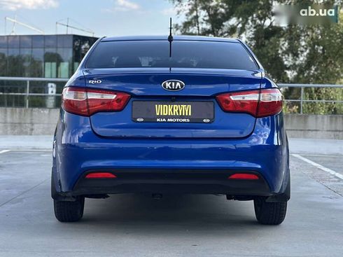 Kia Rio 2013 - фото 14