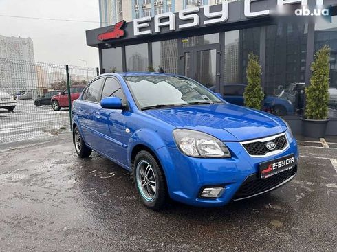 Kia Rio 2011 - фото 11