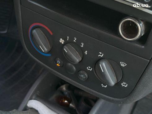 Opel Combo 2011 белый - фото 16