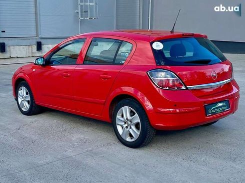 Opel Astra 2008 - фото 14