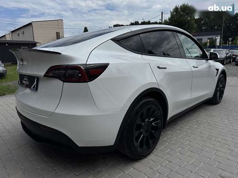 Tesla Model Y 2024 - фото 17