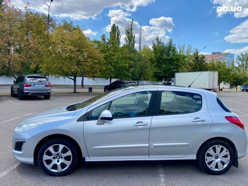 Peugeot 308 2011 серебристый - фото 3