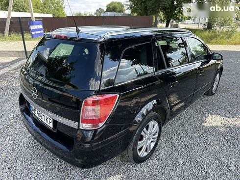 Opel Astra 2009 - фото 17