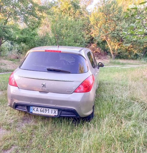 Peugeot 308 2011 золотистый - фото 8