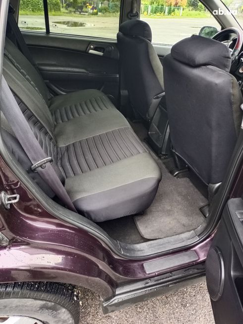 SsangYong Kyron 2010 вишневый - фото 15