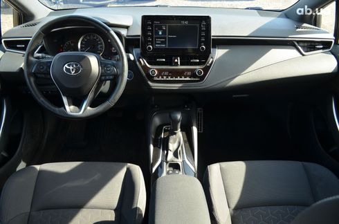 Toyota Corolla 2019 белый - фото 10