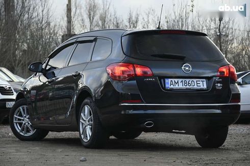 Opel Astra 2014 - фото 8