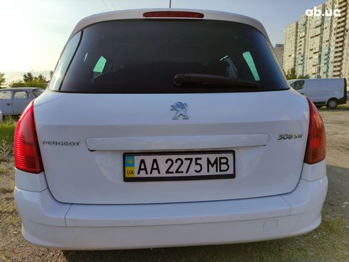 Peugeot 308 2012 белый - фото 5