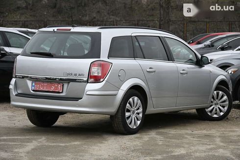 Opel Astra 2010 - фото 14