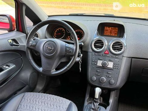 Opel Corsa 2011 - фото 14