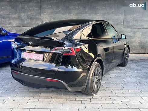 Tesla Model Y 2024 - фото 11