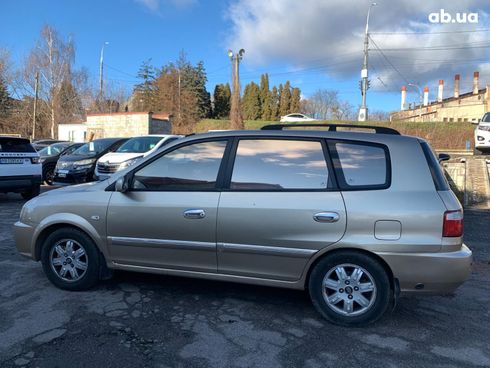 Kia Carens 2003 бежевый - фото 8
