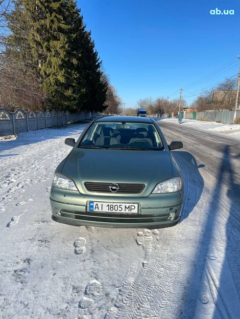 Opel Astra G 2007 зеленый - фото 7