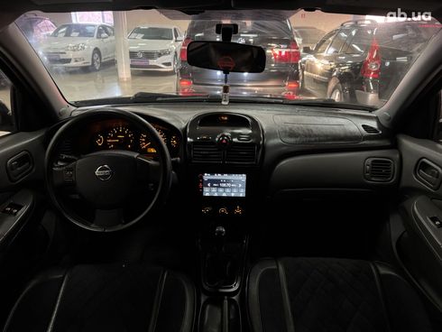 Nissan Almera 2012 черный - фото 8